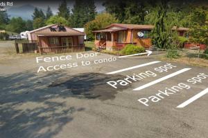 a parking lot with aance door access to a cabin at Cozy Cabin in Packwood in Randle +5 photos