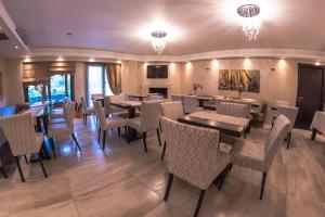 A restaurant or other place to eat at Giotis Boutique Hotel