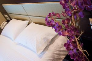 Postel nebo postele na pokoji v ubytování Giotis Boutique Hotel