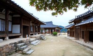 a row of buildings in an asian building at Bukchondaek in Andong