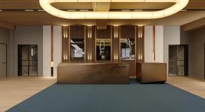 a lobby with a blue carpet and a chandelier at Radisson Blu Hotel, Almaty Airport in Almaty +259 photos