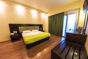 Postel nebo postele na pokoji v ubytování Giotis Boutique Hotel