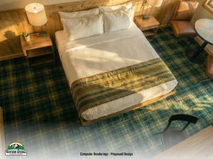 a bedroom with a large bed in a room at Western Riviera Lakeside Lodging in Grand Lake +23 photos