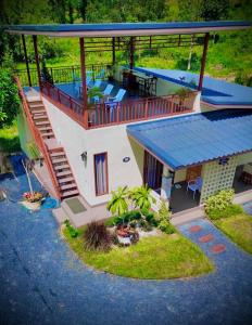 an aerial view of a house with a swimming pool at The wells house krabi in Klong Muang Beach