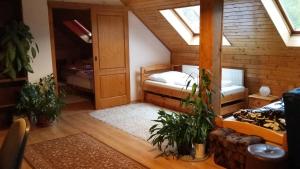 Postel nebo postele na pokoji v ubytování Apartment Rychtrovna