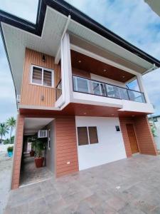 a house with a view of the front of it at Beachfront With 2 Bedrooms and Pool for 20 in San Juan