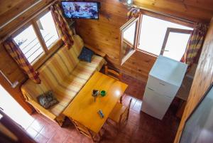 Kuchyň nebo kuchyňský kout v ubytování Cabaña de Madera la Encina