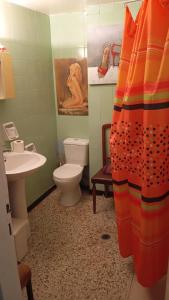 a bathroom with a toilet and a sink at Hellas Palace Rooms CENTER in Sparta +129 photos
