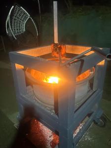 a lantern with a candle in a box with a fan at CENTAURUS Coorg HOMESTAY in Madikeri
