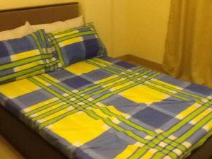 Postel nebo postele na pokoji v ubytování AAM Transient and Guest House