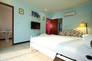 Postel nebo postele na pokoji v ubytování Mallorca Homestay