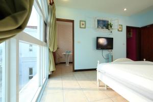 TV a/nebo společenská místnost v ubytování Mallorca Homestay