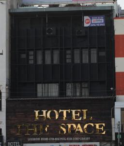 a building with a hotelspace sign in front of it at Hotel The Space in Udaipur