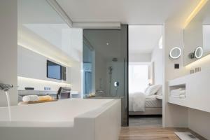 Letto o letti in una camera di Swiio Hotel Daan