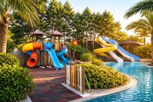 a pool with a water park with a slide at Alodger Sirius Town Lara in Aksu +69 photos
