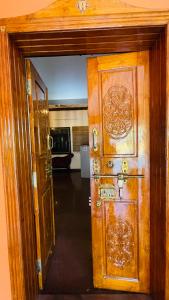 an open door to a room with an open door at Jas Grand Homes in Cochin
