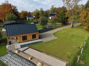 an overhead view of a house with a yard at La Tanière du loup in Malmedy