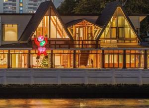 a house with a balloon on the front of it at Baan Manee BKK in Bangkok