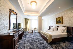 Un televizor și/sau centru de divertisment la Hotel Bulevard