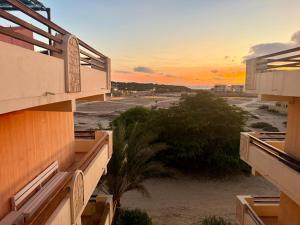 a view of the beach from the balcony of a building at Beachapartment fully serviced in Sal Rei