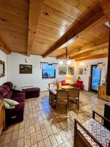 a living room with a couch and a table at Papa Franks House in Ptuj
