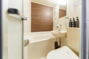 a bathroom with a toilet and a sink at Maison Odori-Higashi building in Sapporo +112 photos