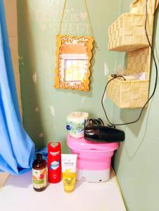 a room with a table with some food and a phone at Το Μικρό Σπίτι στη Φάρμα! in Acharnes +23 photos
