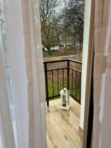 a view of a balcony from the door of a house at Wolność in Elblag