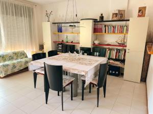 a dining room with a table and chairs at Taormina Sky View in Taormina