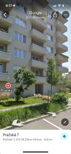 a rendering of a large apartment building at Prosperity Apartment s parkovaním in Žilina