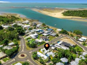 an aerial view of a town next to a beach at Boyne island beach house in Boyne Island