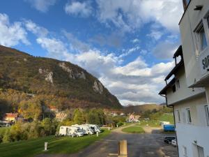 a view of a mountain from a rv park at Jajce Youth - Camp and Accommodation in Jajce