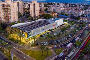 an overhead view of a building in a city at סוויטת גן ליד הים in Qiryat Yam