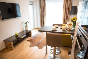 a living room with a table with food on it at Rosaliya in Cochem +5 photos