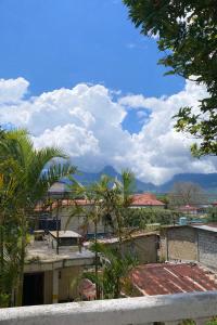 a view from the roof of a building with trees at Ora Living in Maskeliya