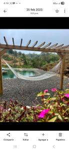 a picture of a bridge over a body of water at Natural Island in Adjuntas