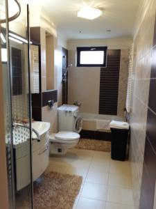 Kúpeľňa v ubytovaní City Centre Apartment