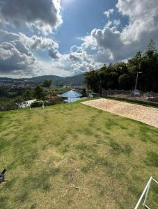 a field of grass with a soccer goal at Apartamentos campestres la Divisa in Santa Rosa de Cabal