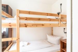 a bunk bed in a room with two bunk beds at Ferienwohnung Manns in Bad Hindelang