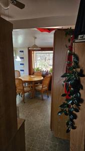a dining room with a table and a wine rack at Gerardín in Flagstaff +17 photos