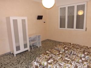 Postel nebo postele na pokoji v ubytování Bed And Breakfast Il Subacqueo