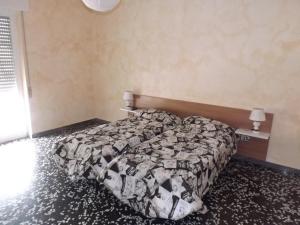 Postel nebo postele na pokoji v ubytování Bed And Breakfast Il Subacqueo