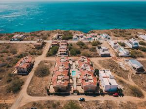 an aerial view of a resort near the ocean at Maluhia Home - Maio in Calheta Do Maio