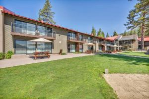 a large building with a lawn in front of it at Cozy Studio wKitchen #217 at Donner Lake Village in Truckee