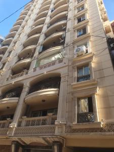 a large building with balconies on the side of it at سي فيو سان ستفانو in Alexandria