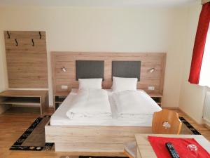 Postel nebo postele na pokoji v ubytování Haus Christine