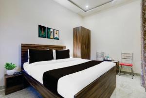 Llit o llits en una habitació de Emerald Hotel 19 fotos més