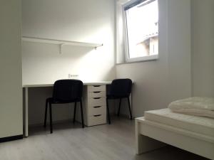 Postelja oz. postelje v sobi nastanitve Apartments Šik 2