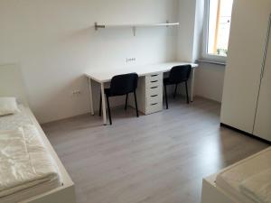 Postelja oz. postelje v sobi nastanitve Apartments Šik 2