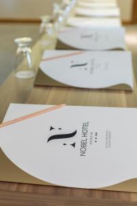 Certifikát, hodnocení, plakát nebo jiný dokument vystavený v ubytování Nobel Hotel